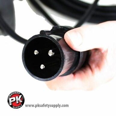 A hand grasps a black industrial power plug with three prongs, leading to a robust cable perfect for the RamFan Intrinsically Safe 12 in. Blower EB7201XX by Euramco. Ensures safety in hazardous areas. PK Safety Supply's logo and site details adorn the bottom left corner for more information.