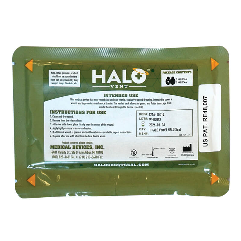 A sealed green package labeled "Aero Healthcare RAPIDSTOP Bleed Control Kit EMS Pro" contains a medical chest seal. The packaging shows instructions, manufacturer info, and a barcode on the right. Brand: Aero Healthcare.