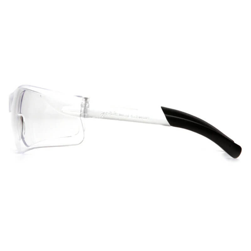 Pyramex Ztek Safety Glasses S2510S by Pyramex Safety feature clear lenses and transparent frames with a black curved temple arm, shown in side view against a white background. ANSI Z87.1 compliant for dependable eye protection. Box contains 12 pairs.