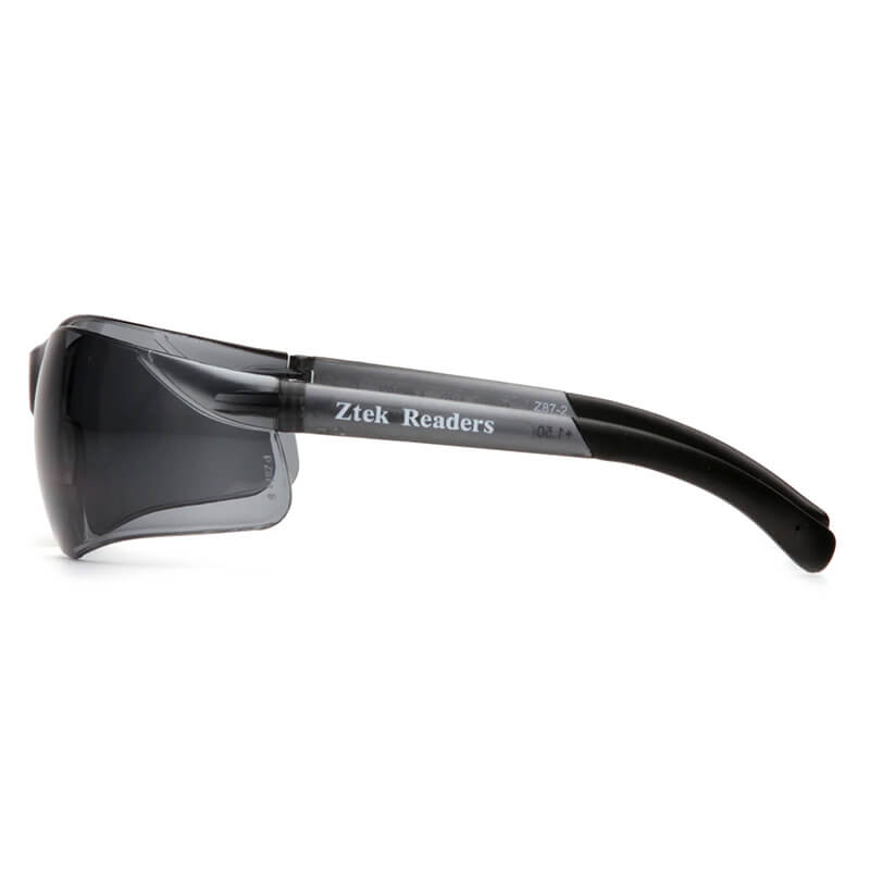 Side view of Pyramex Ztek Reader Safety Glasses S25_0R by Pyramex Safety, featuring black frames, dark scratch-resistant lenses, thick arms with "Ztek Readers" label, and UV protection. Box includes 6 glasses.