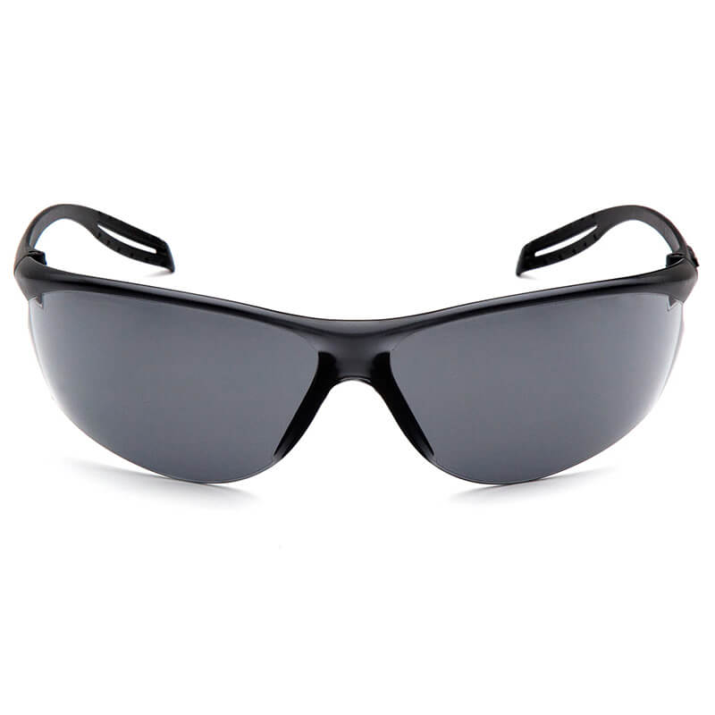 The Pyramex Neshoba H2Max Anti-Fog Safety Glasses by Pyramex Safety feature a sporty black wraparound design with dark polycarbonate lenses, UVA/UVB protection, and curved arms for a secure fit. Displayed on a white background.