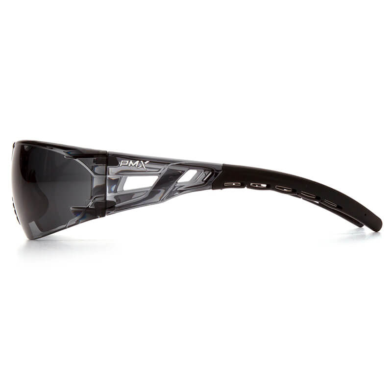 Side view of Pyramex Fyxate H2X Anti-Fog Safety Glasses by Pyramex Safety, featuring sporty wraparound design, dark tinted lenses, black frames, and angular vented side panels for superior impact protection.