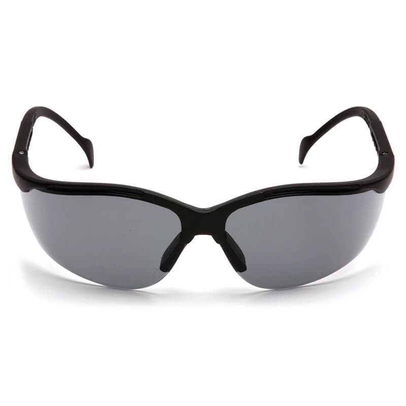 A box of 12 Pyramex Venture II Safety Glasses by Pyramex Safety featuring black wraparound frames and dark UV-protective lenses, shown against a white background.