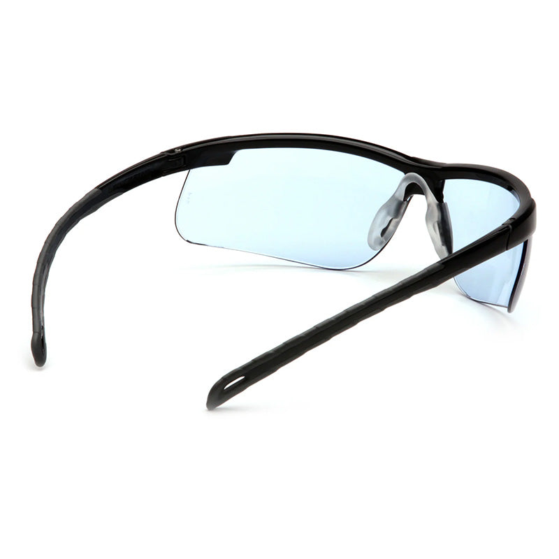 Pyramex Ever-lite Anti-fog Safety Glasses SB86_ _DT by Pyramex Safety, shown from an angled rear view, feature black wraparound frames, light blue-tinted lenses, curved temples, clear nose pads, UV protection, and stylish functionality.