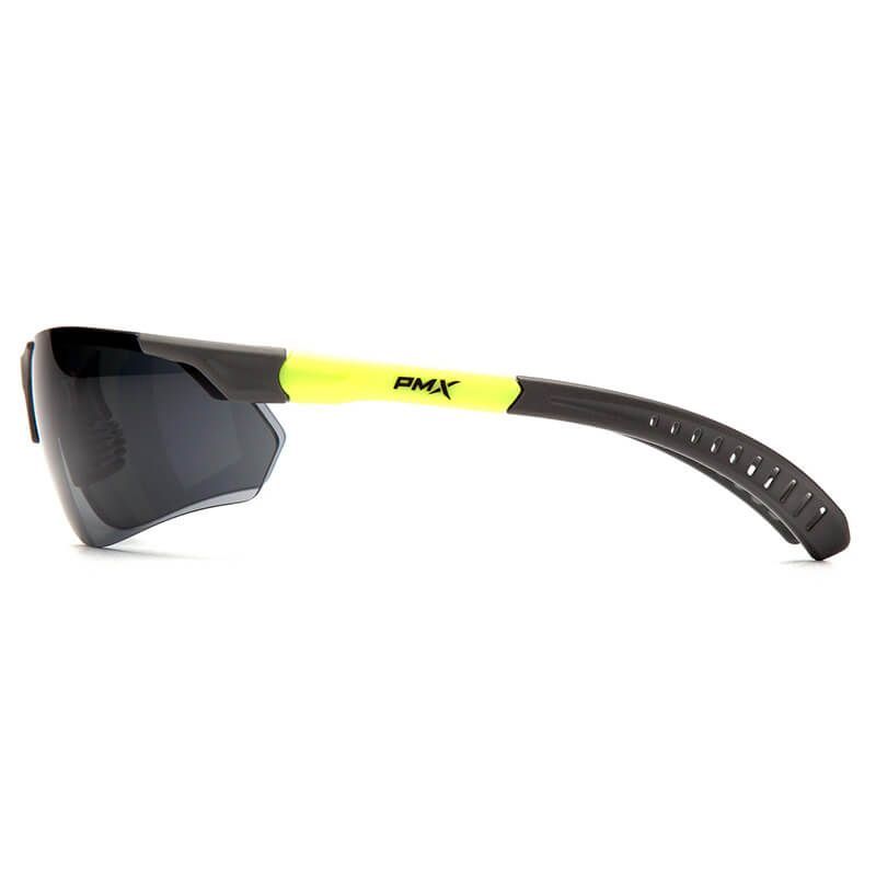 Side view of Pyramex Sitecore Safety Glasses SGL101_0DTM by Pyramex Safety, featuring dark lenses, a black frame with yellow temple accents, visible PMX logo on the arm, and adjustable temples for a custom fit. Sold in boxes of 12.