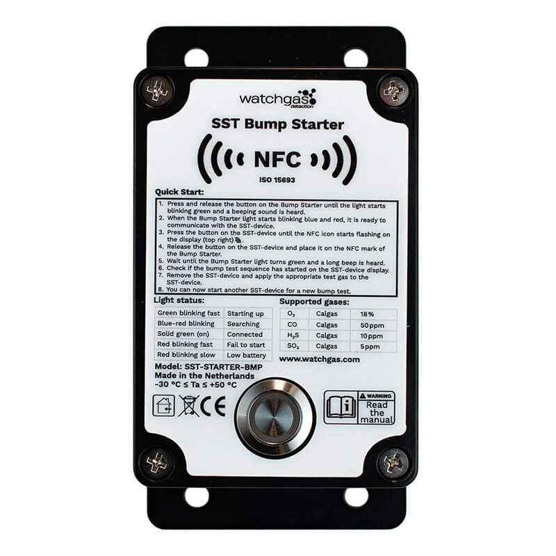 A rectangular device labeled “WatchGas SST1 Bump Test Starter SST1-BS” features a central button, indicator lights key, and a list of supported gas measurements to verify gas detector compliance. The front panel of this portable WatchGas safety tester also displays instructions and a QR code.