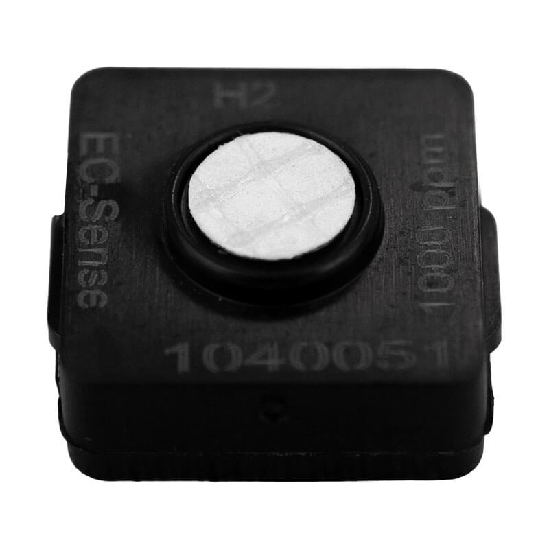 The WatchGas SST1 Replacement H2 Sensor SST-H2-RPL is a compact black sensor with a central metal mesh and "1040051" on the front, designed as a replacement part for WatchGas SST1 gas detector systems.