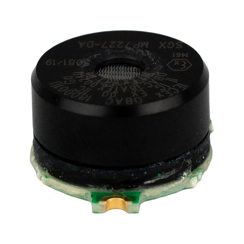 A close-up of a black piezoelectric buzzer with visible markings and a gold connector on a green circuit board, part of the WatchGas SST4-MICRO Replacement LPC LEL Sensor SST-X1-RPL by WatchGas.