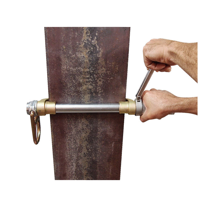 Two hands use a wrench to tighten a pin with a ring and bolt through the Frontline Vertical/Horizontal Fixed Beam Clamp (4"-14" I-Beams) by Frontline Fall Protection, securing the steel anchoring point on a heavy beam.