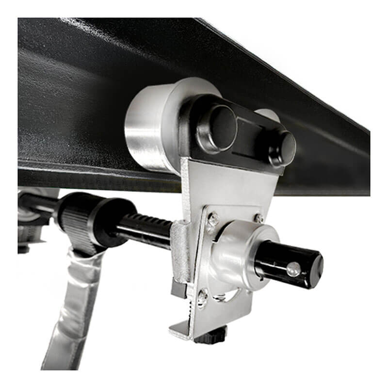 Close-up of the Frontline Beam Trolley Anchor by Frontline Fall Protection, designed for 3"-10" wide I-beams, showing its metal clamp mechanism, cylindrical rollers, adjustment knobs, and securing screw on a black surface.