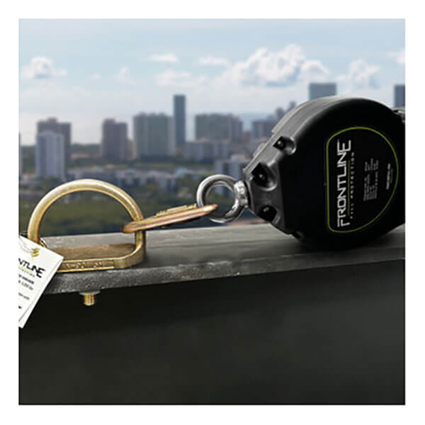 A Frontline Fall Protection safety lanyard is attached to a Frontline Steel Bolt Screw Anchor STB01 on a rooftop, with a blurred city skyline in the background.