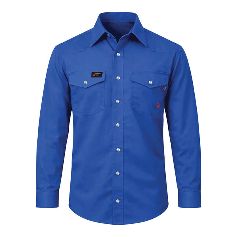 The ForgeFR Forge FR Solid Shirt MFRSLD-002 is a blue, long-sleeved, button-up flame-resistant shirt with two chest pockets, buttoned flaps, black and red logo patches, and is NFPA 2112 compliant for reliable FR workwear.
