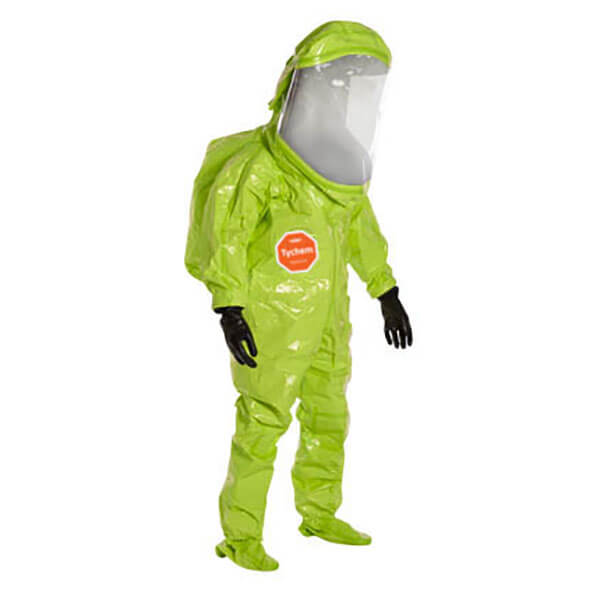A person in a bright green DuPont Tychem 10000 Commander EX Level A Suit TK555T with a clear face shield and black gloves; the hazmat suit features a "Tychem" logo on the chest.