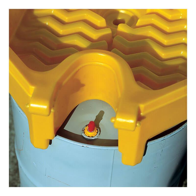 The UltraTech Global Funnel 049_ in yellow sits atop a blue barrel with liquid level monitoring. Its grooved surface pairs with a small red toggle on the lid for safe opening or closing.