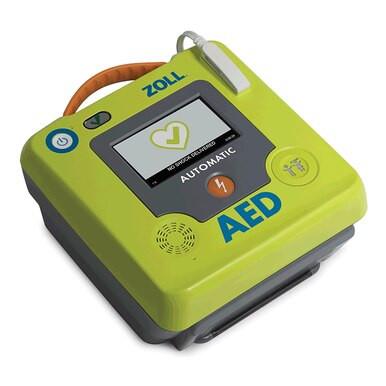 The ZOLL AED 3 Defibrillator Package 8511-00110_-01 is a green device with screen, yellow and power buttons, attached orange cable, and Real CPR Help, designed by ZOLL for swift and effective emergency cardiac response.