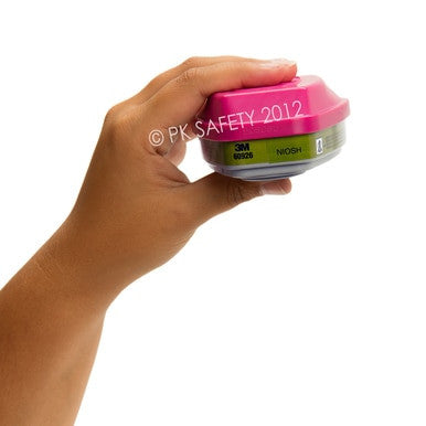 A hand holds a 3M 60926 Multi-Gas P100 Cartridge (Pair) against a white background.