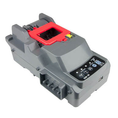 The RKI SDM-3R Stand Alone Calibration Station 81-SDM3R101 is a robust industrial device with a USB port and various connection points, ideal for any setup. Its gray and red design closely resembles a calibration station, featuring buttons, indicators, and a prominent red component on top.