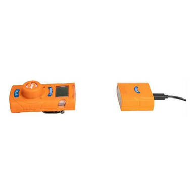 The device is an orange AimSafety unit featuring a small lens on the left and a separate orange rectangular PM-LINK charging module, connected by a cable. It includes blue accents and is equipped with data logging capabilities, complete with a small display screen for easy monitoring.