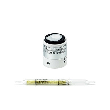 An RKI GX-6000 for Benzene Multi-Gas 72-6AZX-C sensor by RKI Instruments sits beside a transparent glass detector tube filled with yellow granules and black end caps, both displayed on a white background.