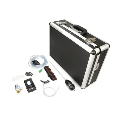 A black hard-shell case with metal edges sits open beside various tools and accessories like hoses, a gauge, a handle, connectors, and attachments. This tidy ensemble features the BW Honeywell GasAlert MicroClip Deluxe Confined Space Kit MC-CK-DL by BW Technologies, neatly arranged on a white background.