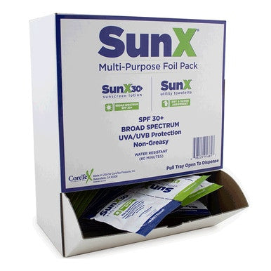 A box of Coretex SunX SPF30 Sunscreen Foil Pack Wallmount (50/Box, 91661) offers broad spectrum UVA/UVB protection. The open box displays water resistant, single-use packets ready for easy dispensing.