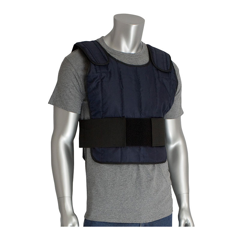 A silver mannequin showcases a gray t-shirt paired with the PIP EZ-Cool Phase Change Cooling Vest System 390-PCVKT1, a dark blue vest with wide straps featuring a velcro closure around the waist. This innovative vest by PIP offers phase change cooling for thermal energy storage. Set against a plain white background, the ensemble epitomizes practicality and sleek design.