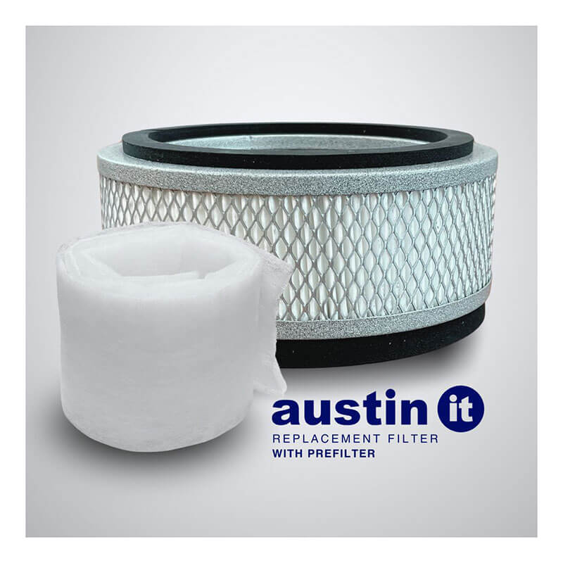 A cylindrical Austin Air Systems "it" Filter with mesh exterior sits next to a rolled white prefilter, providing effective allergy relief. Text below reads “Austin Air 'it' Filter with Prefilter” on a light gray background.