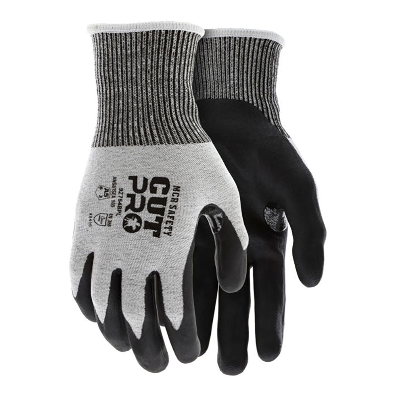A pair of MCR Safety Cut Pro 13 Ga HyperMax Bi-Polymer Gloves (92754BP) in gray/black, with textured palm coating, reinforced thumb crotch, ribbed black-striped cuffs, safety markings, and a "CUT PRO" label.
