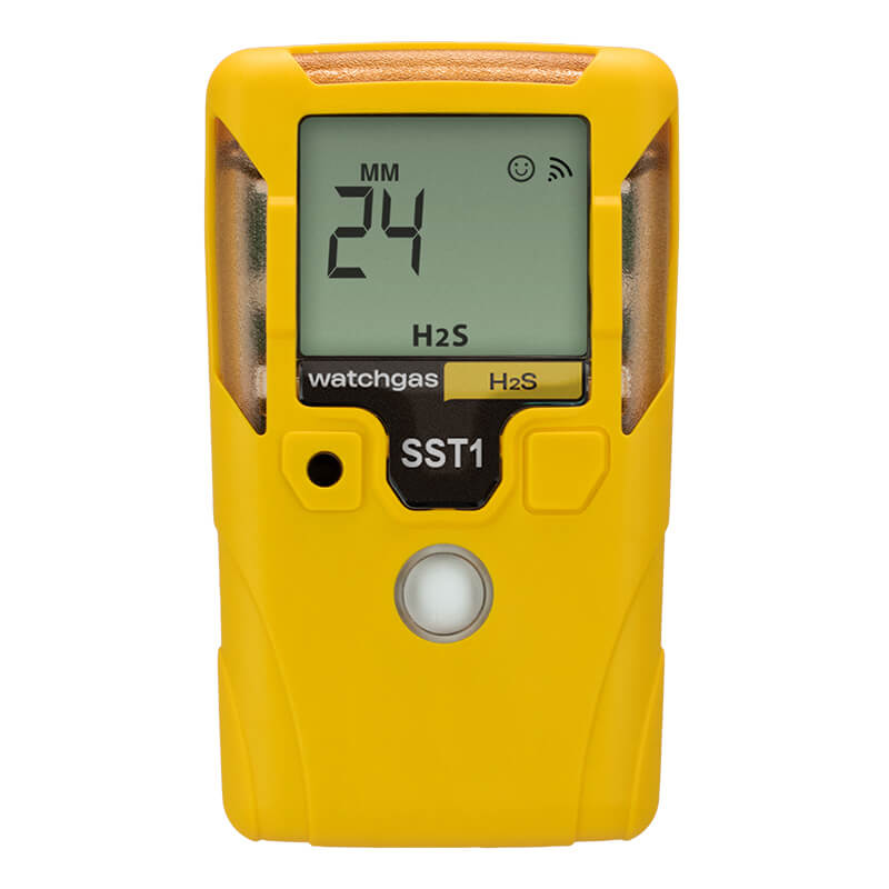 A yellow handheld WatchGas SST1 2 Year H2S Gas Detector (model SST1-H-24) displays “24” and “H2S” on its screen, with “watchgas” and “SST1” labels below. This hydrogen sulfide monitor from WatchGas features a single button and a front sensor area.
