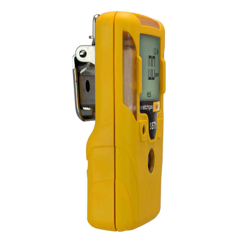 A WatchGas SST1 Serviceable H2S Gas Detector SST1-H, a yellow handheld device with a digital display and a metal clip on the back, is shown at an angle.