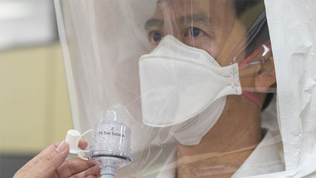 Worker undergoing a respirator fit test.