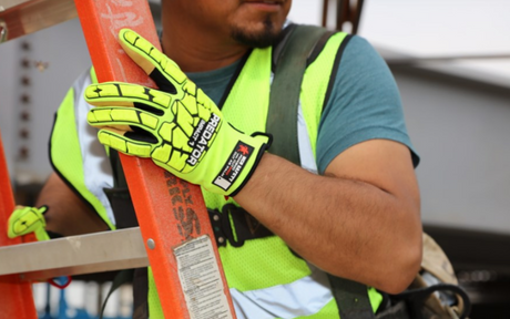 Worker wearing hi-vis impact-resistant work gloves while on a ladder.