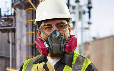 Worker wearing 3M 60921 P100 Organic Vapor Filters on his respirator.