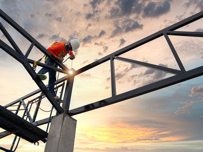 Construction worker working at height.