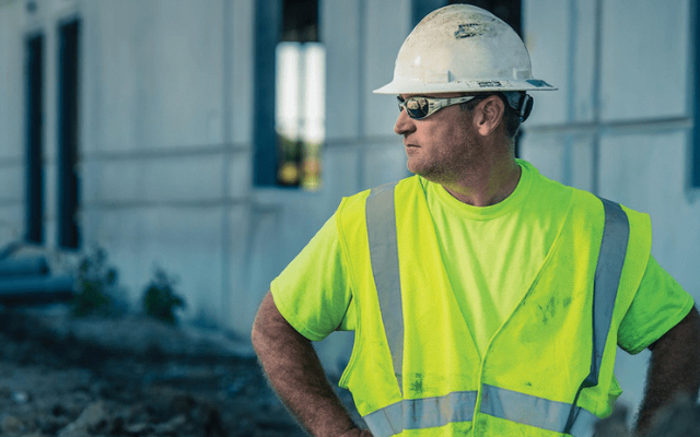 Worker wearing high visibility PPE