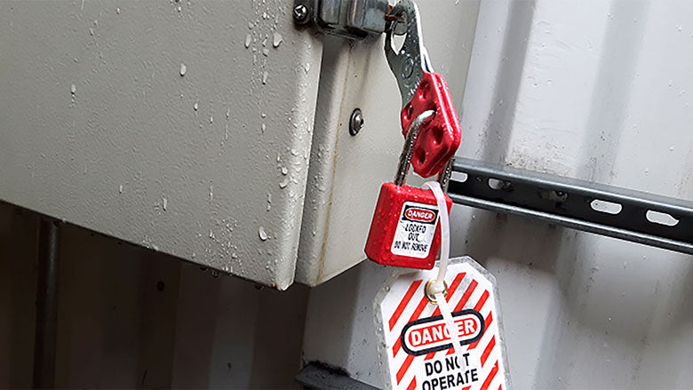 Lockout tagout label at a worksite.