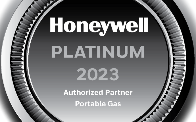 Silver and black circular seal with the text: "Honeywell Platinum 2023, Authorized Partner, Portable Gas." Bold, professional appearance.