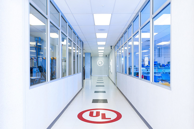 Hallway at Underwriters Laboratories with UL logo on floor.