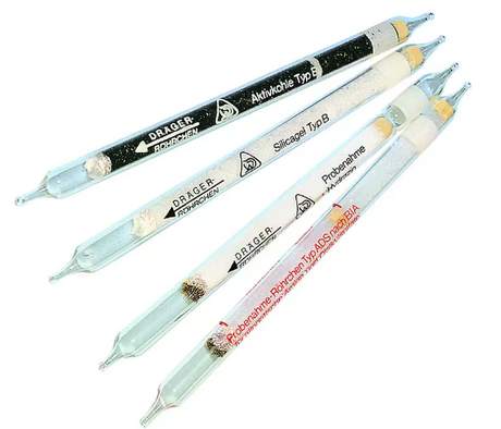 Four Draeger tubes on white background