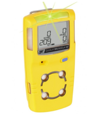 BW Honeywell MCXL gas monitor with flashing lights and white background.