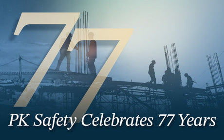 Graphic with the words "PK Safety Celebrates 77 Years" with 77 and blue background workers at a construction site.