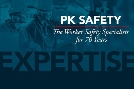 An image reads 'PK Safety, the worker safety specialists for 70 years', conveying a sense of professionalism and experience. The word 'expertise' is displayed at the bottom with bold letters, and the background features two workers wearing safety helmets.