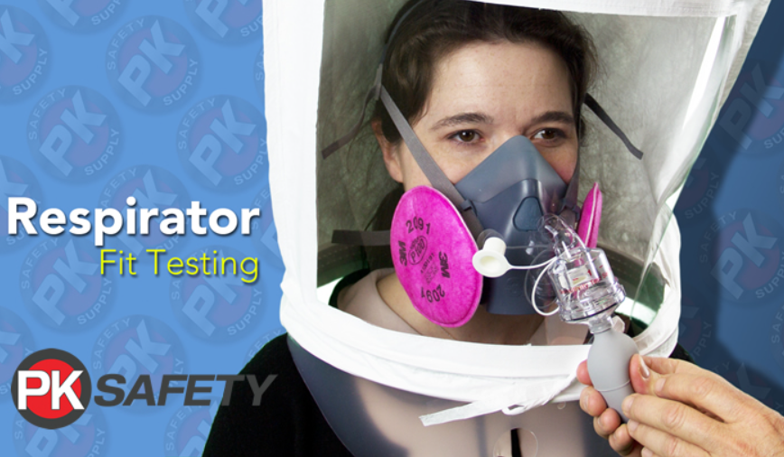Woman wearing a respirator and going through a fit testing procesure.
