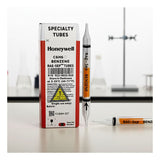 A box of RAE Systems Benzene Separation Tubes 012-3022-010 (10/Box) sits on a lab table beside a clear gas detection tube filled with orange liquid. Blurred lab glassware suggests compatibility with the UltraRAE 3000.