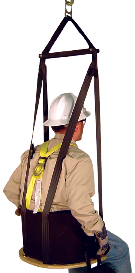 A person wearing a safety harness and hard hat is seated in a French Creek Deluxe Work Seat w/Comfort Seat Back 4151 from French Creek Production, within a suspended rigging system and secured by straps. Facing away from the camera, they are demonstrating fall protection equipment designed for working at heights.