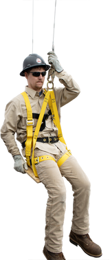A person fully equipped with fall protection gear, including a helmet, gloves, and a high-visibility harness, demonstrates the French Creek Bosun Chair Work Seat 4754. They confidently sit on the platform outdoors with one leg bent, silhouetted by a fence and trees in the background.