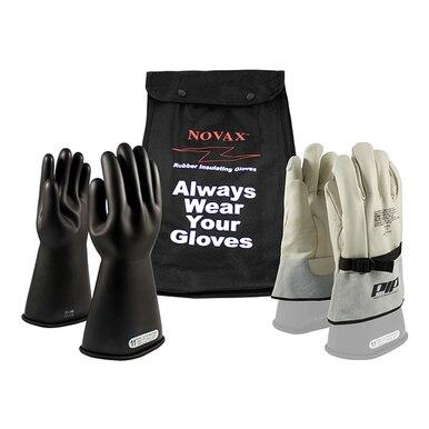 A pair of black PIP NOVAX Class 1 Electrical Safety Kit rubber insulating gloves on stands, a set of beige work gloves with grey cuffs, and a black Novax bag with the text "Always Wear Your Gloves.