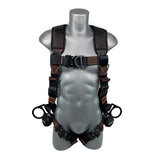 A gray mannequin showcases the Frontline Combat Vest Harness by Frontline Fall Protection, a black and orange moisture-wicking harness with adjustable straps, buckles, metal rings, and front-side D-rings across the chest, waist, and thighs.