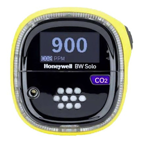 The BW Honeywell BW Solo Wireless Gas Detector CO2 BWS1-BL-Y displays a reading of 900 PPM on its screen. This carbon dioxide monitoring device comes with a yellow casing and features a clear digital display alongside a sleek black front panel, ensuring precise and reliable detection.