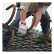 A worker wearing MCR Safety Memphis Big Jake Premium Leather Palm Work Gloves (1700) grips and maneuvers large rusted steel rebar rods in a grid, their hands protected by these sturdy gloves while their face stays out of view.